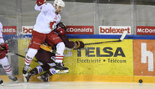 GROSSMANN (LHC) charge VOELLMIN (GS) contre la bande                  30.12.2020 , Genève-Servette - Lausanne  GS-LHCphoto Eric Lafargue