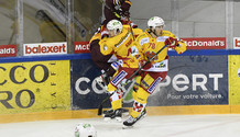 VERMIN (GS) écrasé contre la bande par KREIS - POULIOT , 78 (BI)     13.3.2021 , Genève-Servette - Bienne  GS-BI  photo Eric Lafargue